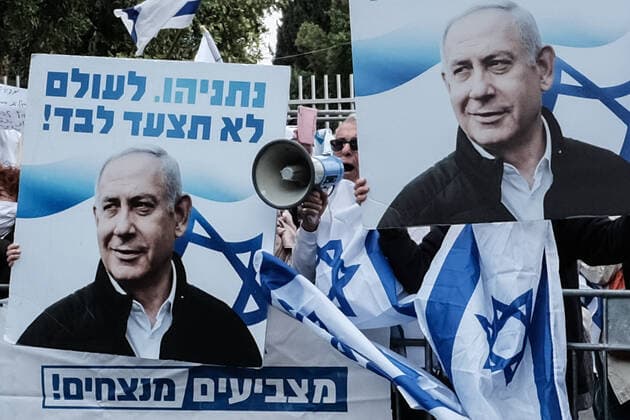 May 24, 2020, Jerusalem, Israel: Opposing groups of protesters gather outside the Prime Minister s Residence in Jerusalem before NetanyahuÃ¢â‚¬â ¢s trial opens later today on charges of bribery, fraud and breach of trust at the Jerusalem District Court. Black Flag protesters represent the danger corruption poses to democracy, while others accuse Attorney General Mandelblit, NetanyahuÃ¢â‚¬â ¢s personal appointment, of succumbing to left wing political pressure. Unprecedented, Netanyahu will become IsraelÃ¢â‚¬â ¢s first serving prime minister to go on criminal trial. Jerusalem Israel - ZUMAa126 20200524_zap_a126_016 Copyright: xNirxAlonx