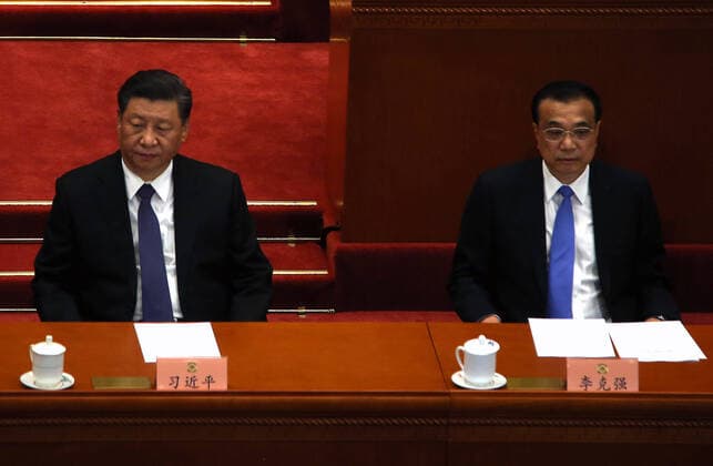 Chinese President Xi Jinping (L) and Premier Li Keqiang attend the closing ceremony of the Chinese People s Political Consultative Conference (CPPCC) in the Great Hall of the People in Beijing on Wednesday, May 27, 2020. After being postponed from March due to the coronavirus outbreak, the annual CPPCC parliamentary session closed in the capital with over two thousand delegates from across China in attendance.  PEK2020052731 STEPHENxSHAVER