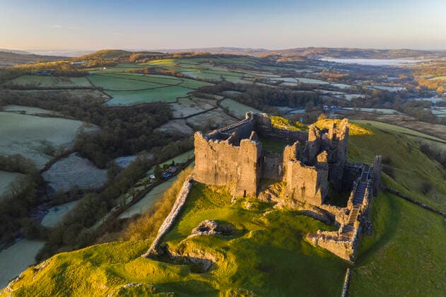 Aerial vista by drone of Carreg Cennen Castle, Brecon Beacons National Park, Carmarthenshire, Wales, United Kingdom, Europe Copyright: AdamxBurton 799-4012
