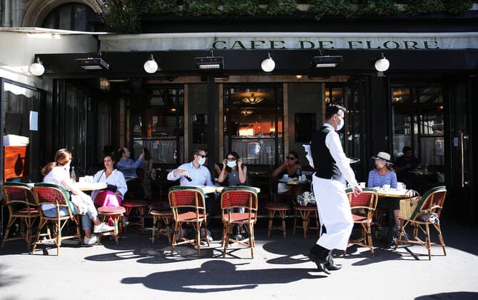 (200610) -- PARIS, June 10, 2020 -- People have breakfast on the terrace of Cafe de Flore in Paris, France, June 2, 2020. The French government has decided to end the state of health emergency on July 10, two weeks ahead of the previously scheduled date, and expected to retain certain power to restrict freedom in the next months to contain the spread of coronavirus, French daily Le Monde reported on Wednesday. France, one of the European countries worst hit by the coronavirus pandemic, declared a state of health emergency on March 24. ) FRANCE-PARIS-COVID-19-STATE OF HEALTH EMERGENCY GaoxJing 