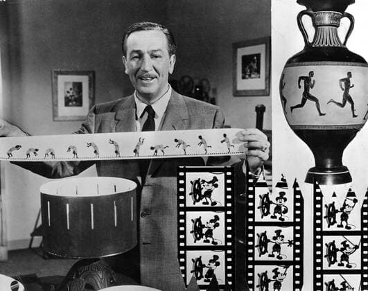 WALT DISNEY WALT DISNEY 1901 -1966 Animator, Director, Producer, Studio Executive holds a strip for a zoetrope. Inset: frames from first Mickey Mouse cartoon, Steamboat Willie WALT DISNEY. Strictly editorial use only in conjunction with the promotion of the film. Credit line mandatory. This image is copyright of the film company and is supplied under the terms of issue as film still. No commercial or book cover use permitted without prior consent from the film company.  Mandatory credit line: Image courtesy Ronald Grant Archive Mary Evans