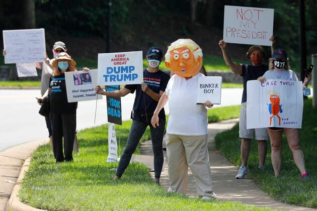 June 21, 2020, Sterling, Virginia, USA: Protesters gather outside Trump National Golf Club Washington DC in Sterling, Virginia while United States President Donald J. Trump plays golf on June 21, 2020 Sterling USA - ZUMAs152 20200621_zaa_s152_019 Copyright: xYurixGripasx