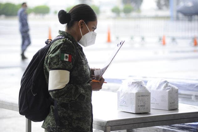 Military officers wear face masks while organizing medical supplies in the General Health Warehouse to be distributed in the country s various hospitals to treat patients infected with COVID-19. Where: Mexico City, Mexico When: 22 Jun 2020 Credit: Eyepix Cover Images **EDITORIAL USE ONLY** Copyright: xRicardoxCastelanxCruzx 40665359 EDITORIAL USE ONLY. NOT FOR USE BY NEWSPAPERS BASED IN THE UK.