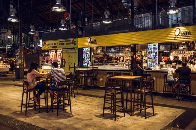 June 23, 2020, Barcelona, Catalonia, Spain: Customers sit at a bar in a still not fully recovered La Boqueria market in Barcelona at the beginning of the new normality after lifting a more than three months long state of alarm due to the continuous spread of the corona virus. During this new period mobility restrictions end while hygiene and safe-distancing measures will remain. It will last till there is an effective treatment or a vaccine for the coronavirus. Barcelona Spain - ZUMAo105 20200623_zap_o105_005 Copyright: xMatthiasxOesterlex