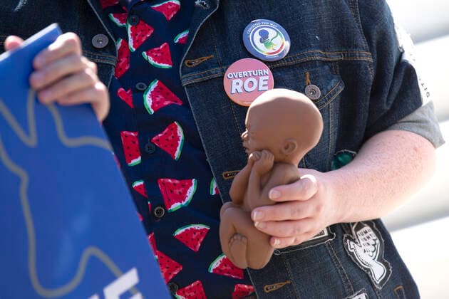 June 29, 2020, Washington, District of Columbia, USA: A Pro-Life activist holds a 22 week fetal model during a rally outside the United States Supreme Court in Washington D.C., U.S., on Monday, June 29, 2020. The Court delivered a 5-4 ruling blocking a restrictive abortion law in Louisiana Monday morning. Credit: CNP Washington USA - ZUMAs152 20200629_zaa_s152_033 Copyright: xStefanixReynoldsx