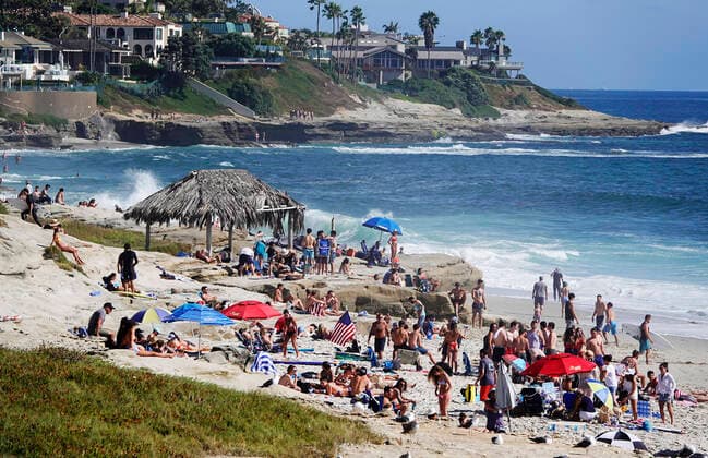 July 3, 2020, San Diego, California, USA: People pack a La Jolla Beach the day before the Fourth of July. Many Southern California beaches were closed for the holiday weekend due to coronavirus concerns. San Diego beaches remained open. San Diego USA - ZUMAa97_ 20200703_zaf_a97_003 Copyright: xK.C.xAlfredx