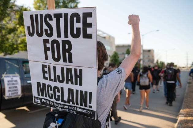 July 3, 2020, Aurora, Colorado, USA: A man marches through the streets of Aurora Colorado. Aurora USA - ZUMAt221 20200703_zap_t221_003 Copyright: xTylerxTomasellox