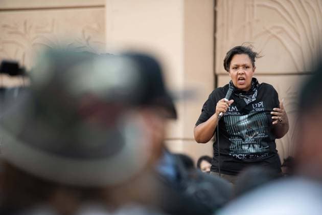 July 3, 2020, Aurora, Colorado, USA: McClain family friend, Candace Bailey, pumps up a crowd before a march in Aurora, Colorado on Friday July 3rd, 2020 Aurora USA - ZUMAt221 20200703_zap_t221_019 Copyright: xTylerxTomasellox