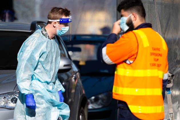 July 1, 2020, Melbourne, VIC, USA: MELBOURNE, AUSTRALIA - JULY 01: An ADF Officer is seen wearing full PPE in the Fawkner Mobile Testing Site as the military has been called in to assist civilian doctors administer up to 20,000 tests per day as 36 Melbourne suburbs go back into strict lockdown in Victoria during COVID 19 on 1 July, 2020 in Melbourne, Australia. Victoria is suffering from a sustained increase in new infections amid a record testing blitz of 20,000 tests per day in MelbourneÃ¢â‚¬â ¢s hotspots. Victoria has recorded 73 new coronavirus cases overnight which brings the total active cases up to 370 since Thursday 25 June. The State Premier, Daniel Andrews announced on Tuesday 30 June that 36 Melbourne suburbs will again be forced - ZUMAi88_ 20200701_zaf_i88_017 Copyright: xSpeedxMediax