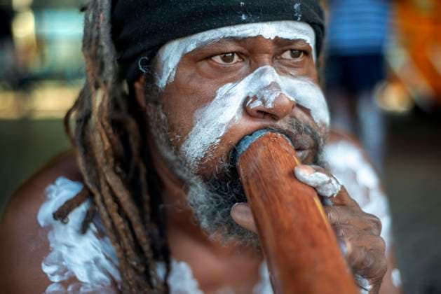 Australian Aboriginal dressed man selling music cd in The Rocks area at Circular Quay in Sydney New South Wales, Australia Sydney New South Wales Australia Copyright: xSergixReboredox SRE-092-EJ6118