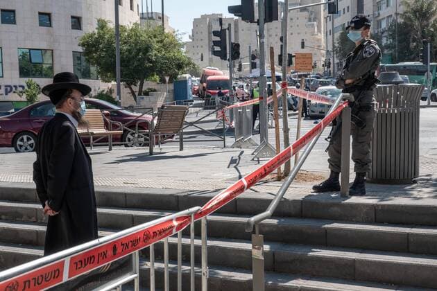 July 12, 2020, Jerusalem, Israel: Police enforce a lockdown on the predominantly Jewish religious neighborhood of Romema in Jerusalem, as well as others in 5 cities nationwide, as the number of new confirmed COVID-19 cases surges. A significant new outbreak of Coronavirus brings on reclosure of segments of the economy. Israel now ranked 7th in the world with 4,100 confirmed cases per million capita. Jerusalem Israel - ZUMAa126 20200712_zap_a126_023 Copyright: xNirxAlonx