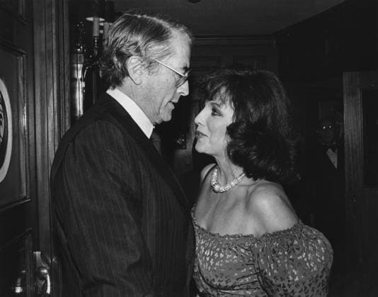 Gregory Peck and Joan Collins Los Angeles.CA.USA. LIBRARY. Gregory Peck and Joan Collins at an event. Early 1980s. ReCap:11.07.2020 LMK30-S110720PBOR-001. 