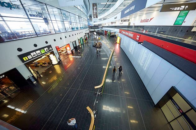 (200715) -- VIENNA, July 15, 2020 (Xinhua) -- People are seen in a terminal building of the Vienna International Airport in Vienna, Austria, on July 15, 2020. The Vienna Airport registered a decline of 95.4% to 138,124 travelers in June 2020 compared with the previous year. The accumulated passenger volume in the period January to June 2020 fell by 65.3% to 5.1 million. (Photo by Georges Schneider Xinhua) AUSTRIA-VIENNA-COVID-19-AIRPORT-PASSENGER VOLUME-DECREASE 
