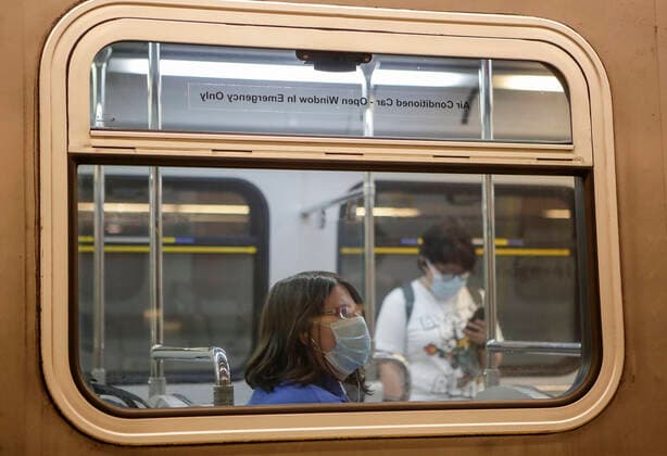 (200718) -- VANCOUVER, July 18, 2020 -- Passengers wearing face masks ride a SkyTrain in Vancouver, British Columbia, Canada, on July 18, 2020. As new COVID-19 cases in British Columbia continued to tick upwards, health officials urged those who can to wear a mask on transit and in other confined spaces, such as grocery stores. (Photo by Xinhua) CANADA-VANCOUVER-COVID-19-FACE MASKS LiangxSen 