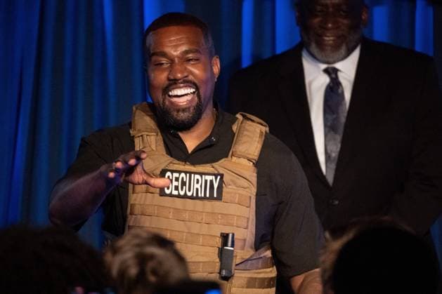 American rapper and entrepreneur Kanye West, wearing a bulletproof vest, addresses supporters during his first campaign event in the upcoming presidential election, Sunday, July 19 2020, in North Charleston, South Carolina. Kanye told the crowd that everyone that has a baby should get a million dollars and that marijuana should be free.  CHS20200719203 RICHARDxELLIS