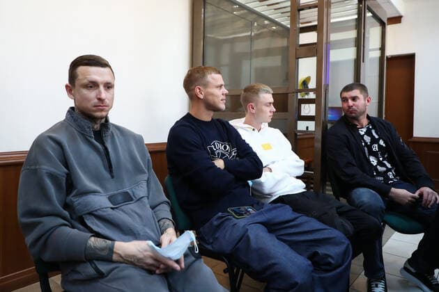 MOSCOW, RUSSIA - JULY 31, 2020: Russian football players Pavel Mamaev, Alexander Kokorin, Kokorin s brother Kirill, and their friend Alexander Protasovitsky (L-R) attend a resentencing hearing in the hooliganism case at Moscow City Court. Anton Novoderezhkin TASS  TS0E1C54