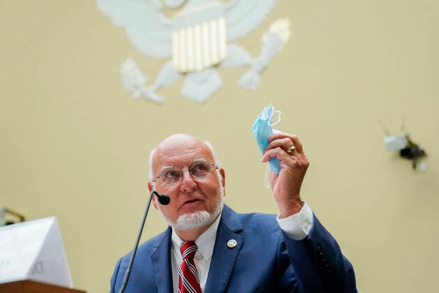 Robert Redfield, director of the Centers for Disease Control and Prevention (CDC), holds a protective mask while speaking during a House Select Subcommittee on the Coronavirus Crisis hearing in Washington, D.C., U.S., on Friday, July 31, 2020. Trump administration officials are set to defend the federal government s response to the coronavirus crisis at the hearing hosted by a House panel calling for a national plan to contain the virus. Copyright: xPoolxviaxCNPx MediaPunchx