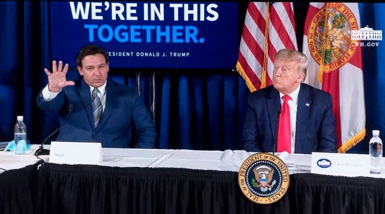 July 31, 2020 - Belleair, Florida, U.S. - A screen grab of Florida Governor RON DESANTIS during a press event with President DONALD TRUMP at the Pelican Golf Club as they discuss the COVID-19 pandemic and the threat from Hurricane Isaias. Trump later held a fundraiser at the club. Belleair U.S. - ZUMAce6_ 20200731_zaf_ce6_012 Copyright: xBrianxCahnx