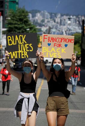 (200801) -- VANCOUVER, Aug. 1, 2020 -- Protestors take part in the Emancipation Day march in Vancouver, British Columbia, Canada, August 1, 2020. In conjunction with the Black Lives Matter protest, thousands of people took part in a march to commemorate the Emancipation Day in Canada, which is marked on August 1. (Photo by Xinhua) CANADA-VANCOUVER-EMANCIPATION DAY MARCH LiangxSen 