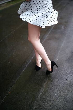Woman dancing in the rain wearing black heels Sarajevo, Federation of Bosnia and Herzegovina, Bosnia and Herzegovina CR_NIMA200627-417930-01