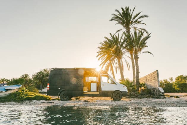 Camper van parked on beach during sunset in Baja, Mexico. Baja California, Chis., Mexico CR_JUSLKY200806-466794-01 ,property released