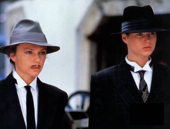 WILD ORCHID JACQUELINE BISSET, CARRE OTIS WOMEN DRESSED AS MEN Date: 1990. Strictly editorial use only in conjunction with the promotion of the film. Credit line mandatory. This image is copyright of the film company and is supplied under the terms of issue as film still. No commercial or book cover use permitted without prior consent from the film company.  Mandatory credit line: Image courtesy Ronald Grant Archive Mary Evans
