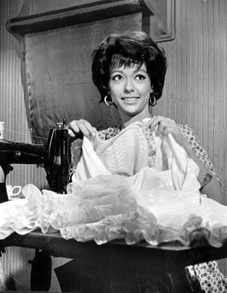 WEST SIDE STORY RITA MORENO Date: 1961. Strictly editorial use only in conjunction with the promotion of the film. Credit line mandatory. This image is copyright of the film company and is supplied under the terms of issue as film still. No commercial or book cover use permitted without prior consent from the film company.  Mandatory credit line: Image courtesy Ronald Grant Archive Mary Evans