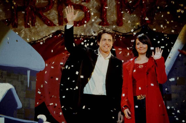LOVE ACTUALLY HUGH GRANT, MARTINE McCUTCHEON Date: 2003. Strictly editorial use only in conjunction with the promotion of the film. Credit line mandatory. This image is copyright of the film company and is supplied under the terms of issue as film still. No commercial or book cover use permitted without prior consent from the film company.  Mandatory credit line: Image courtesy UNIVERSAL PICTURES Ronald Grant Archive Mary Evans