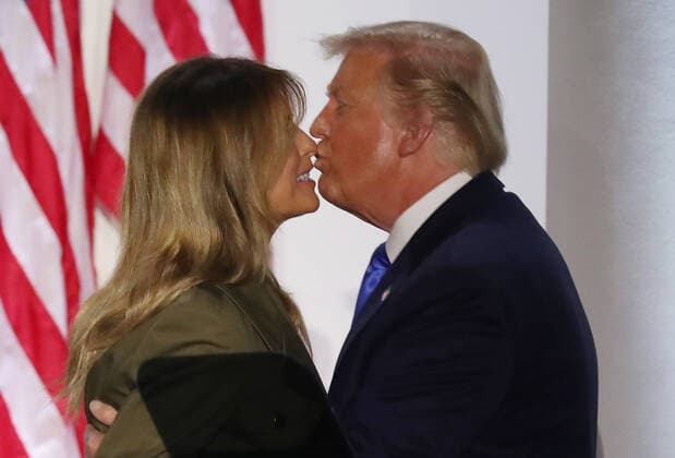 US President Donald J. Trump kisses US First Lady Melania Trump after the First Lady delivered her speech during the second night of the Republican National Convention, in the Rose Garden at the White House in Washington, DC, USA, 25 August 2020. Due to the coronavirus pandemic the Republican Party has moved to a televised format for its convention. Copyright: xRNCx xCNPx MediaPunchx