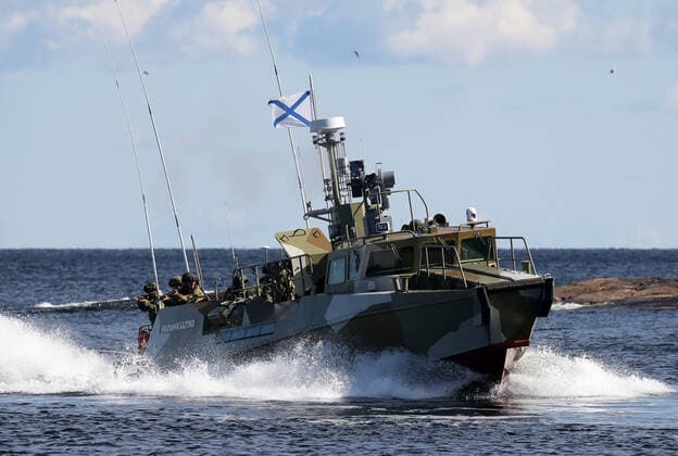 LENINGRAD REGION, RUSSIA - AUGUST 26, 2020: The Raptor patrol boat (Project 03160) takes part in a seaborne landing exercise on Gogland Island in the Gulf of Finland. Peter Kovalev TASS  TS0E4C9E