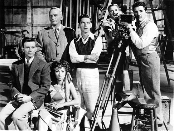 SINGIN IN THE RAIN US 1952 L-R DONALD OCONNOR, MILLARD MITCHELL, RITA MORENO, ? , ? , DOUGLAS FOWLEY. Strictly editorial use only in conjunction with the promotion of the film. Credit line mandatory. This image is copyright of the film company and is supplied under the terms of issue as film still. No commercial or book cover use permitted without prior consent from the film company.  Mandatory credit line: Image courtesy MGM Ronald Grant Archive Mary Evans