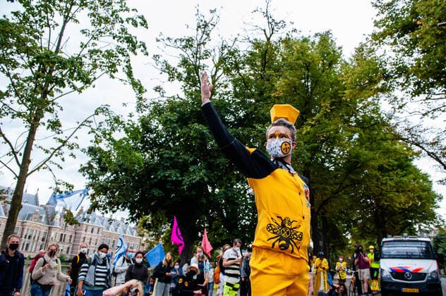 September 1, 2020, The Hague, South Holland, Netherlands: An XR model showing his bees design clothes during the fashion show..An XR fashion show was carried out in front of the House of Representatives in The Hague. Models wore yellow, black, and white colourful second-hand outfits to symbolise the collectivity of bees, to show that thinking and working together can help us out of this crisis. The Hague Netherlands - ZUMAs197 20200901_zaa_s197_022 Copyright: xAnaxFernandezx