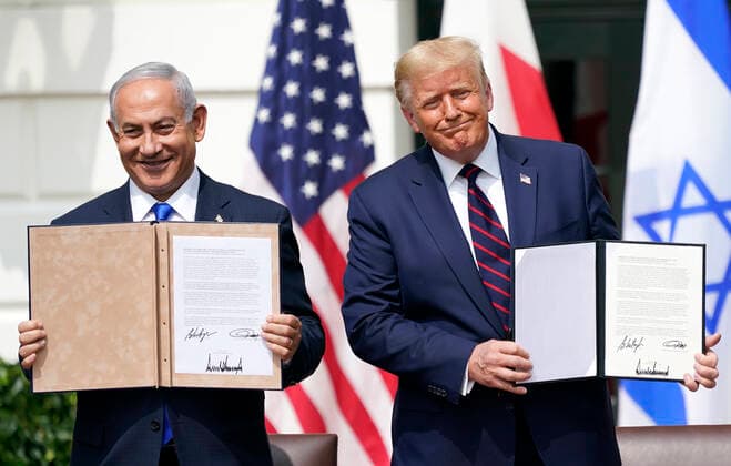 Prime Minister Benjamin Netanyhu of Israel and United States President Donald J. Trump show signed copies of the Abraham Accords during a signing ceremony on the South Lawn of the White House in Washington, DC on Tuesday, September 15, 2020. Copyright: xIndependentxStillxPoolxphotox 2020xConsolidatedxNewsxPhotosxxxAllxRightsxReservedx