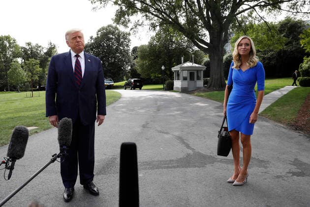 September 15, 2020, Washington, District of Columbia, USA: United States President Donald J. Trump with White House Press Secretary Kayleigh McEnany speaks with reporters on the South Lawn of the White House in Washington before his departure to Philadelphia on September 15, 2020 Washington USA - ZUMAs152 20200915_zaa_s152_314 Copyright: xYurixGripasx-xPoolxViaxCnpx
