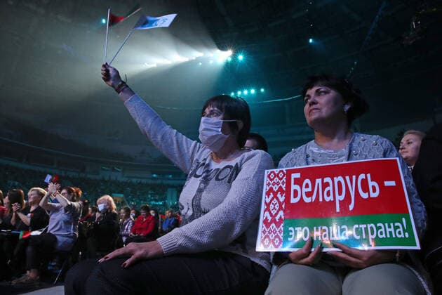 MINSK, BELARUS - SEPTEMBER 17, 2020: Women watch a concert for the Belarusian Union of Women at Minsk Arena. A sign reads Belarus Is Our Country . Natalia Fedosenko TASS  TS0E74C3