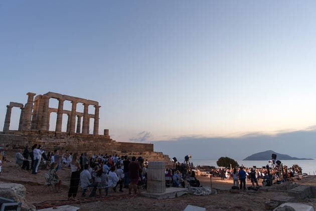 (200917) -- ATHENS, Sept. 17, 2020 -- Musicians perform a musical in front of the ruins of the Temple of Poseidon at cape Sounion, some 70 km southeast of Athens, Greece, on Sept. 17, 2020. On the occasion of the 70th anniversary of the establishment of the Greek National Tourism Organization (GNTO) and the 71st anniversary of the founding of the People s Republic of China and the Mid-Autumn festival, a musical entitled As long as there shall be Achaeans -- Variations on a Sunbeam was staged on Thursday in front of the ruins of the emblematic 2,500-year-old Temple of Poseidon, the god of the sea in Greek mythology. ) GREECE-CAPE SOUNION-MUSICAL-SINO-GREEK FRIENDSHIP MariosxLolos 