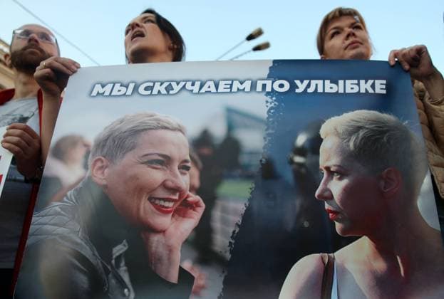 MINSK, BELARUS - SEPTEMBER 20, 2020: Opposition supporters hold a sign depicting member of the Belarusian opposition coordination council Maria Kolesnikova, reading We Miss Your Smile during a rally in Independence Avenue. Mass protests against the presidential election results have been erupting in Minsk and other Belarusian cities since 9 August. Natalia Fedosenko TASS  TS0E7ABF