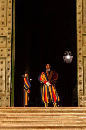NO FRANCE - NO SWITZERLAND: September 23, 2020 : Pontifical Swiss Guards stand guard at the Bronze Door in Saint Peter s Squeare in the Vatican.  Copyright: xMASSIMILIANOxxMIGLIORATOx xIPAx xCatholicxPressxPhotox