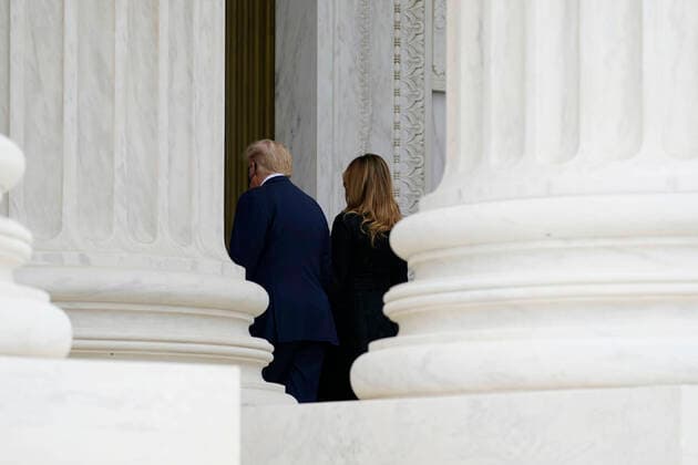 United States President Donald J. Trump, left, and First Lady Melania Trump, walk away after paying respects to Justice Ruth Bader Ginsburg, as she lies in repose under the Portico at the top of the front steps of the U.S. Supreme Court building on Thursday, Sept. 24 2020, in Washington. Ginsburg, 87, died of cancer on Sept. 18. Copyright: xAlexxBrandonx xPoolxviaxCNPx MediaPunchx