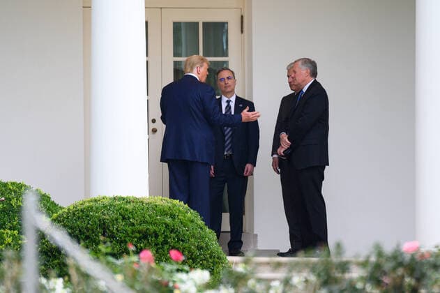 United States President Donald J. Trump speaks with White House counsel Pat Cipollone, national security adviser Robert O Brien and White House chief of staff Mark Meadows outside the Oval Office of the White House after visiting the Supreme Court to pay respects to Justice Ruth Bader Ginsburg, in Washington, D.C., U.S., on Thursday, September 24, 2020. Copyright: xErinxScottx xPoolxviaxCNPx MediaPunchx