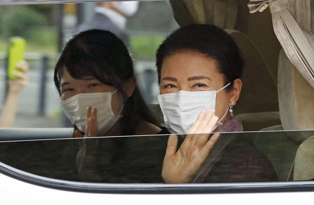Japanese Empress Masako, Princess Aiko Japanese Empress Masako (R) and Princess Aiko wave from a car on Oct. 6, 2020, as they visit the Imperial Palace in Tokyo to see a building that is going to be their residence once renovation is done. They were wearing face masks amid continued worries over the novel coronavirus. 