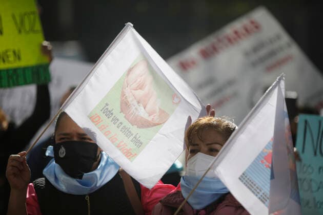 Mexico: Protest against legalization of Abortion Demonstrators of National Front For Family take part during a protest against legalization of abortion in the country, outside the Senate of Mexico, while Senators discuss the modification of a law for the decriminalization or not of abortion in Mexico City, Mexico. **World Rights ** Mexico City Mexico Copyright: MarianaxBae