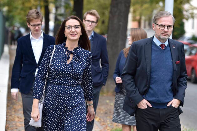 Opposition leader Petr Fiala (Civic Democrats, ODS) and his wife Jana Fialova are going to vote during the first day of second round of Senate election in Brno, Czech Republic, October 9, 2020. (CTKxPhoto VaclavxSalek) CTKPhotoP202010090726301 sal 03