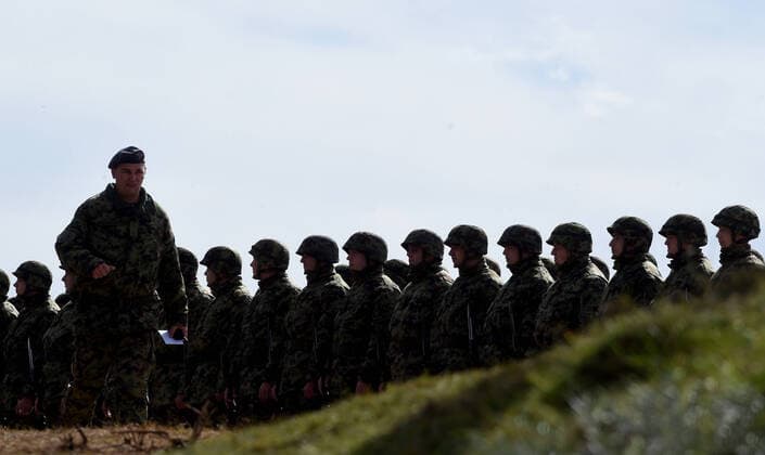 (201011) -- PESTER, Oct. 11, 2020 -- Serbian soldiers participate in a military exercise at the Pester plateau in southwestern Serbia on Oct. 10, 2020. The Serbian army held a large live-fire tactical exercise on Saturday with a focus on close air support. The exercise demonstrated a joint action of about 2,800 members of the Air Force, the Army, the 72nd Special Operations Brigade, and the 63rd Parachute Brigade, more than 150 combat and non-combat vehicles and combat systems, as well as about 40 aircraft. (Photo by Xinhua) SERBIA-PESTER-MILITARY-EXERCISE PredragxMilosavljevic 