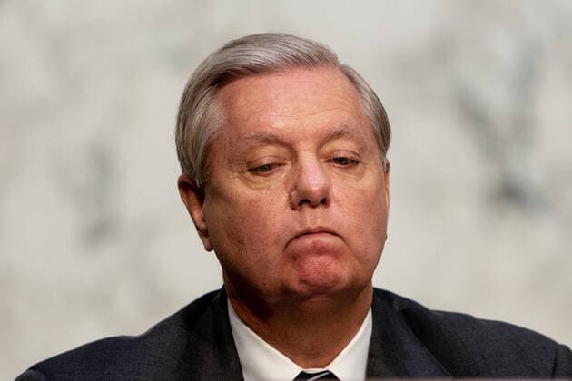 Senate Judiciary Committee Chairman Lindsey Graham (R-SC) listens when Supreme Court nominee Judge Amy Coney Barrett appears before the Senate Judiciary Committee confirmation hearing on Capitol Hill on October 12, 2020 in Washington, DC. Barrett was nominated by President Donald Trump to fill the vacancy left by Justice Ruth Bader Ginsburg who passed away in September. Pool photo by Erin Schaff  WAX20201012983 ERINxSCHAFF