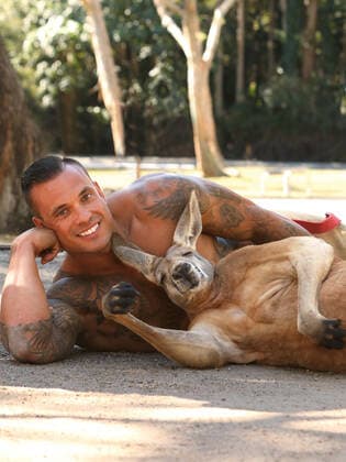 The 2021 Australian Firefighters calendar is here to save 2020. Every October a selection of Australia?s fittest firemen strip off and pose for the Australian Firefighter s Calendar in order to raise money for charity. In the 2021 edition not only do we get to look at some very attractive men, but some adorable animals too; from koalas and kangaroos to rescue kittens and rottweiler puppies. 2019 and early 2020 was a particularly devastating time, and the world grieved with Australia as we suffered through catastrophic bushfires, and an estimated loss of 1 billion animals from our diverse native wildlife. While the fires may have gone, the destroyed bushland has made it impossible for many of the displaced wildlife to return to their n Copyright: xx 40940081 EDITORIAL USE ONLY. NOT FOR USE BY NEWSPAPERS BASED IN THE UK.