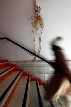 A visitor looks at the Altar de muertos (lit. The Altar of the Dead ), isntalled at the main stairs of the headquarters of the House of Mexico in Madrid, central Spain, 17 October 2020. Visitors will have the chance to learn about the culture and origins surrounding the tradition of death in Mexico. Altar de muertos in the House of Mexico, in Madrid !ACHTUNG: NUR REDAKTIONELLE NUTZUNG!  Copyright: xMariscalx GRAF2498 20201017-637385545317587440