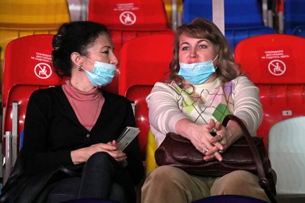 MOSCOW, RUSSIA - OCTOBER 23, 2020: Spectators wear face masks during the Athletes Salute the Great Victory concert held at the Megasport Sport Palace to mark this year s 75th anniversary of the victory in World War II. Vyacheslav Prokofyev TASS  TS0EBDF6