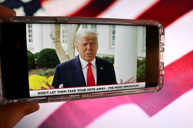 October 31, 2020, Seattle, United States: In this photo illustration President Donald Trump appears in a YouTube video on his official campaign channel urging Americans to vote early and vote in person Seattle United States - ZUMAs197 20201031_zaa_s197_243 Copyright: xTobyxScottx