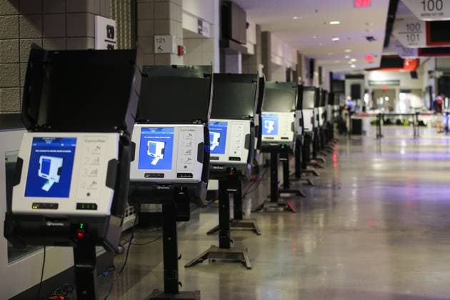 WASHINGTON, D.C., USA - NOVEMBER 2, 2020: Express voting devices at a polling station set up at Capital One Arena for the upcoming 2020 general elections. On Election Day, November 3, the country is to elect a president and vice president, 35 Senators, all 435 members of the House of Representatives, 13 governors of 11 states and two US territories, as well as state and local government officials. Incumbent Republican President Donald Trump and Democratic Party nominee Joe Biden are running for president. Yegor Aleyev TASS  TS0ECF3A